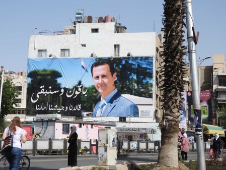 Assad huge poster