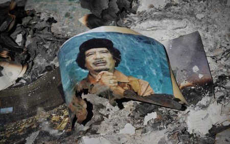Gaddafi poster dust